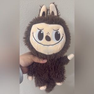 Labubu Adorable Brown Fuzzy Creature Plush – Soft Stuffed Toy Brown